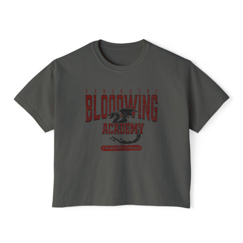 Bloodwing Academy crop top from thtgrlreads featuring a vintage wash Comfort Colors base in dark gray with a distressed red graphic of a dragon and gothic text, part of the Bloodwing Academy and Tees collections.