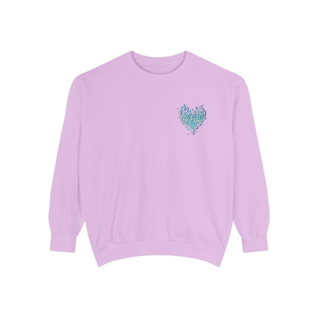 Zodiac Academy crewneck sweatshirt by thtgrlreads featuring a vintage-wash lavender Comfort Colors base and a small blue flame heart graphic on the chest.
