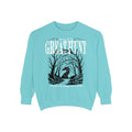 Thtgrlreads Hollow collection oversized crewneck sweatshirt in vintage-washed Comfort Colors teal featuring a dark fantasy graphic of a dragon silhouette among twisted trees with "Great Hunt" text in distressed print.