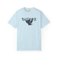 A light blue Comfort Colors graphic tee from thtgrlreads featuring a vintage wash and a whimsical black bird with spread wings centered between bold "Raivox" text, part of The Eating Woods collection.