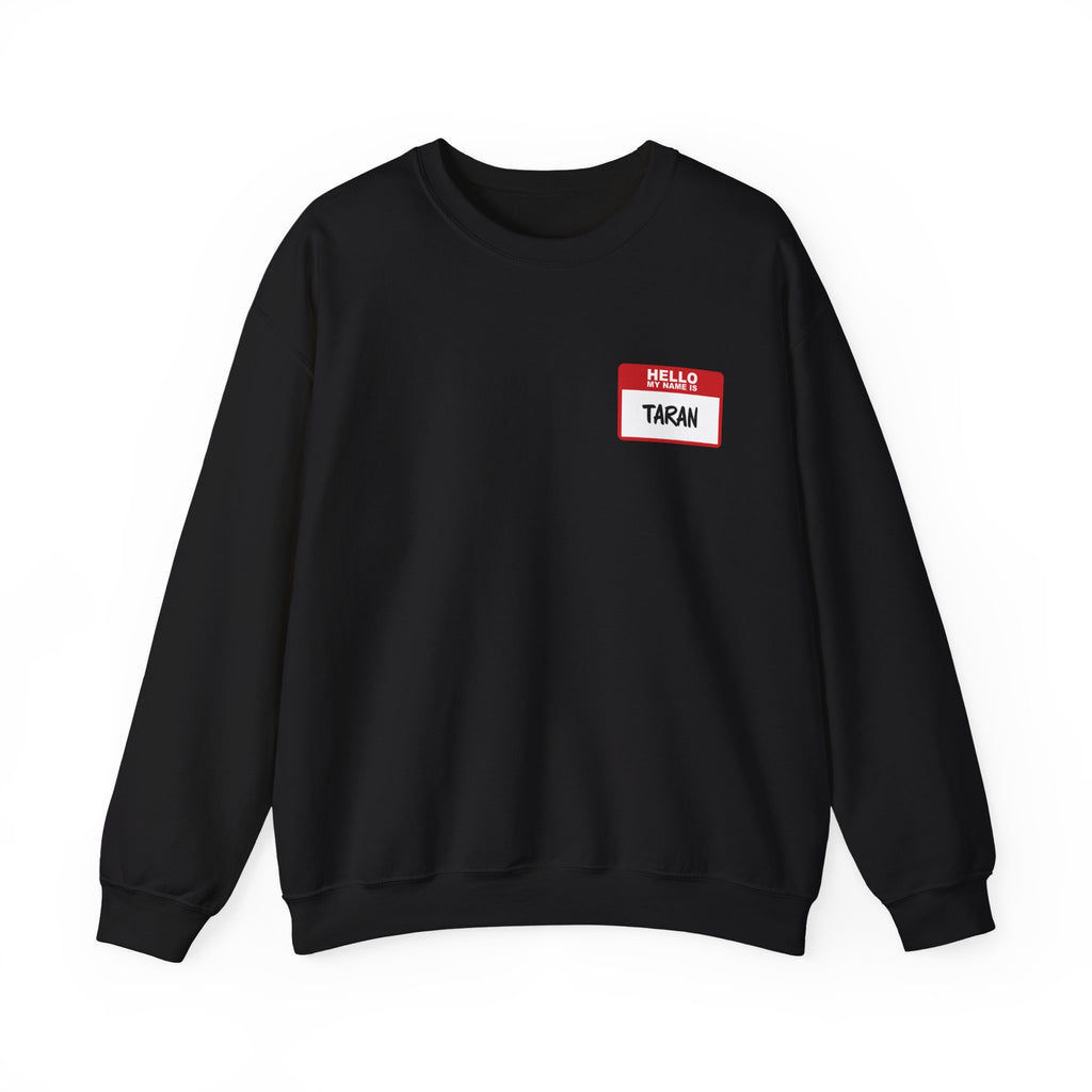 Black oversized crewneck sweatshirt from thtgrlreads' Kindred's Curse Saga collection featuring a vintage style red and white "Hello My Name Is Taran" nametag graphic on the chest.
